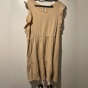 Cute cream versatile dress. I’m 5’7 and it hits me above the knee.